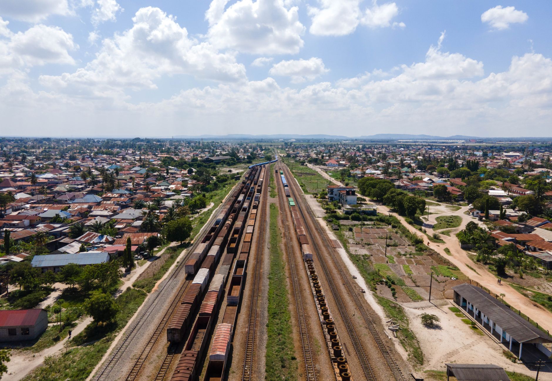 Explore urban landscapes with this aerial view of railways in Dar es Salaam, Tanzania, on a clear day.