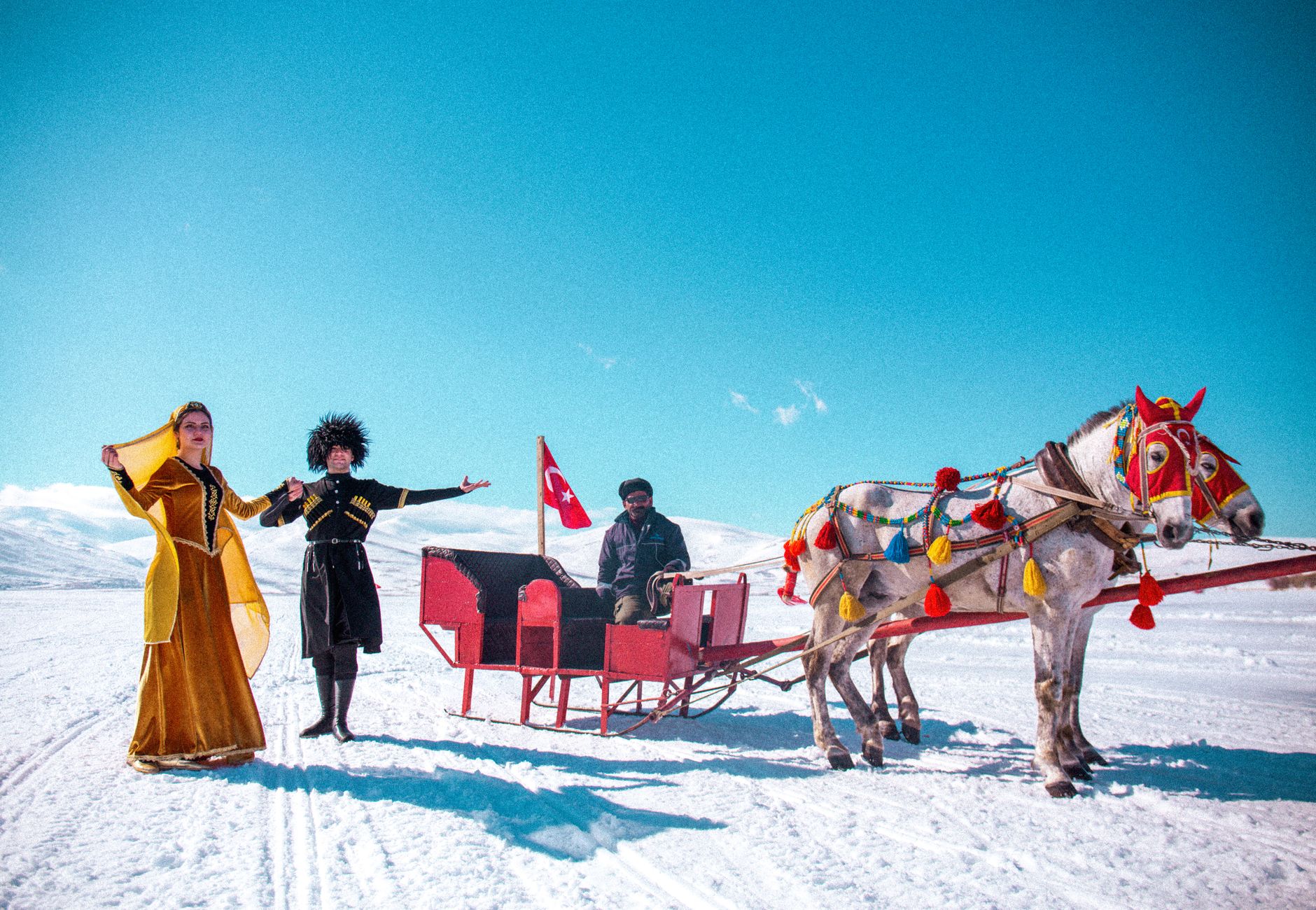 Celebrate winter in Kars with a vibrant horse sled ride, cultural dresses, and snowy landscapes.